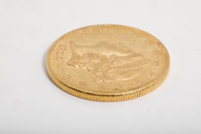 Une pièce de 20 dollars or datée de 1858...