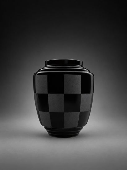 Ovoid black glass vase with a checkerboard...