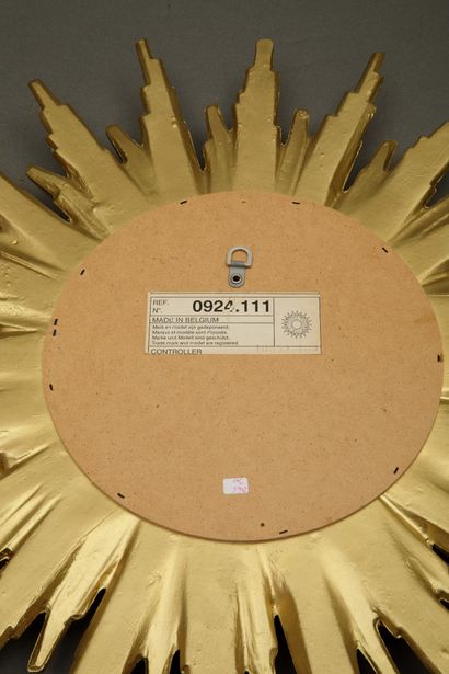 Radiating wooden mirror in the Louis XIV...