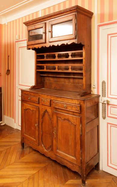 Natural wood sideboard with molded and carved...