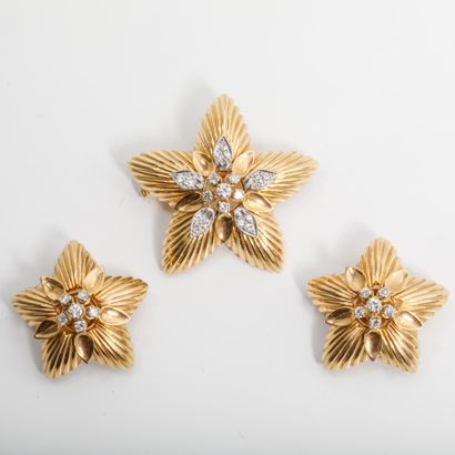A half-set made of 750 gold and 850 platinum,...