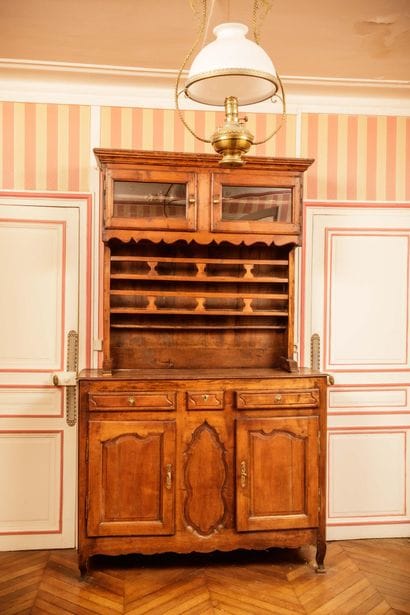 Natural wood sideboard with molded and carved...