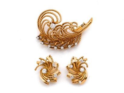 A set made of 750-thousandth gold (twisted)...