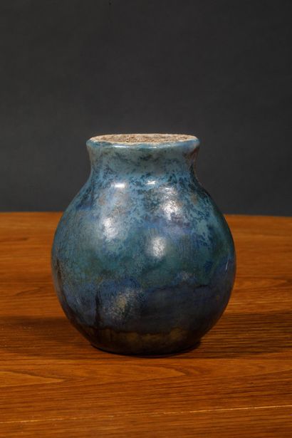 Turquoise blue glazed stoneware vase with...