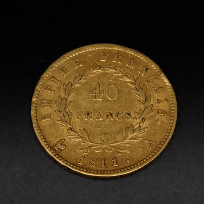 Une pièce de 40 francs or Napoléon Ier datée...