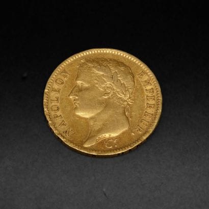 Une pièce de 40 francs or Napoléon Ier datée...