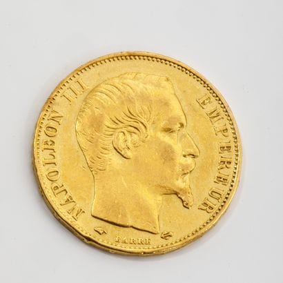 Une pièce de 20 francs or Napoléon III tête...