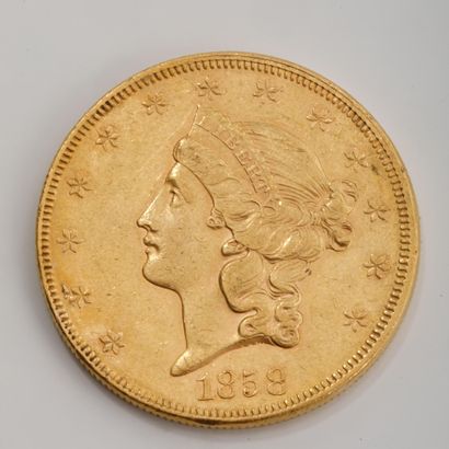 Une pièce de 20 dollars or datée de 1858...