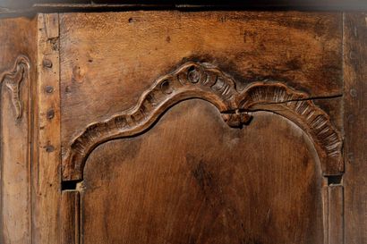A tomb-shaped chest of drawers made of natural,...