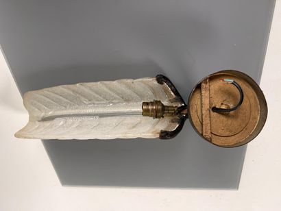 In the style of Jean PERZEL
Wall sconce made...