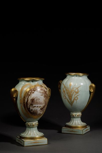 Pair of polychrome glazed porcelain vases...