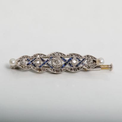 750 thousandths white gold and 925 thousandths...