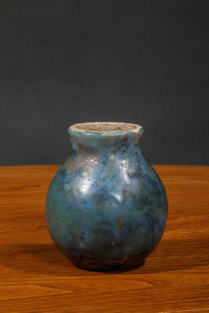 Turquoise blue glazed stoneware vase with...