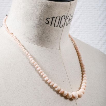 Light pink coral pearl necklace, known as...