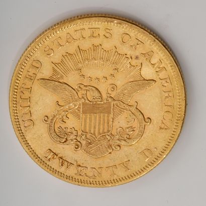 Une pièce de 20 dollars or datée de 1858...