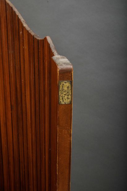 In the style of Baumann 
Wavy folding screen...