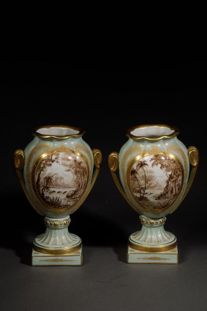 Pair of polychrome glazed porcelain vases...