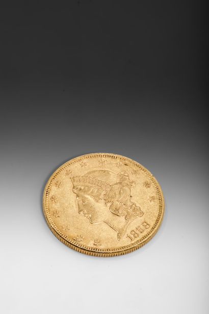 Une pièce de 20 dollars or datée de 1858...