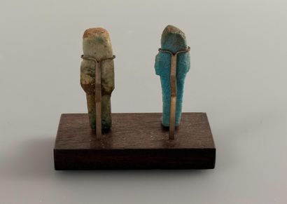 Two uninscribed ushabti figures depicting...