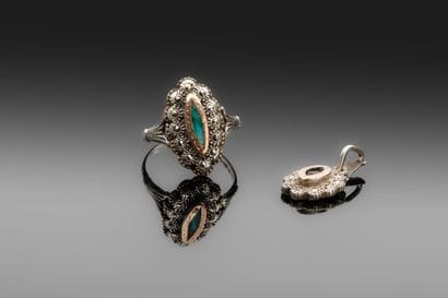 Set comprising a ring and a pendant in partially...