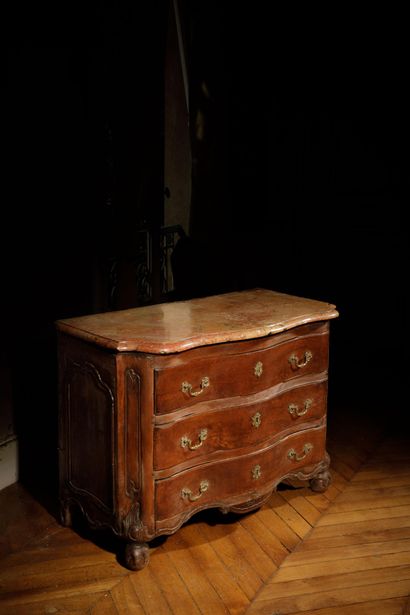 A tomb-shaped chest of drawers made of natural,...