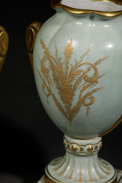 Pair of polychrome glazed porcelain vases...