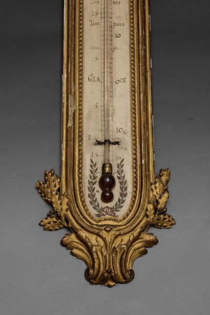 Gilded wooden thermometer, carved with an...