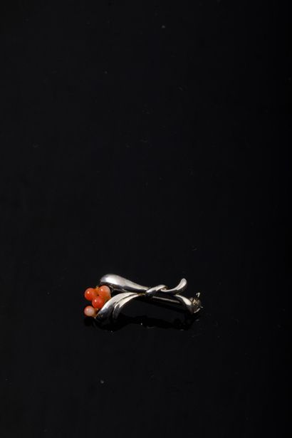 Small silver plated pin brooch featuring...