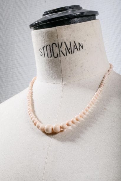 Light pink coral pearl necklace, known as...
