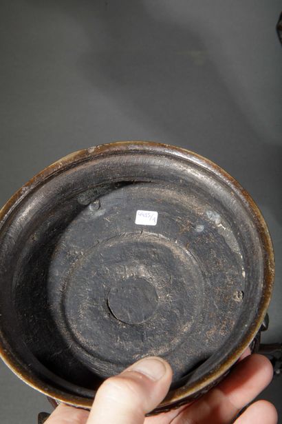 INDOCHINA, 20TH CENTURY
Pair of bronze vases...