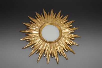 Radiating wooden mirror in the Louis XIV...