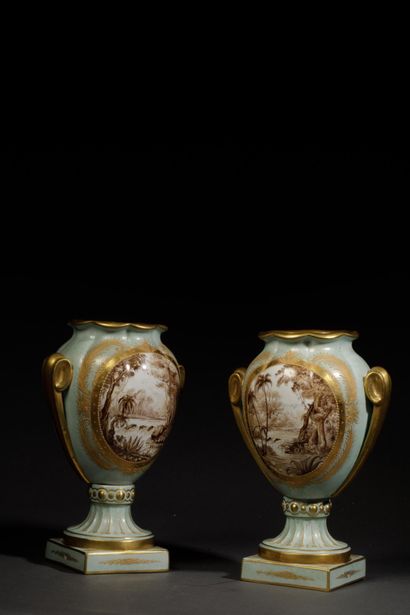 Pair of polychrome glazed porcelain vases...