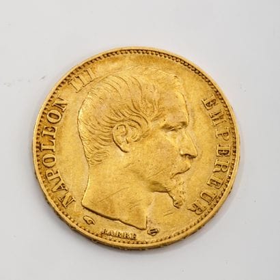 Une pièce de 20 francs or Napoléon III tête...