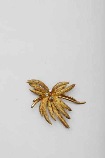 Palm tree brooch in yellow gold 750 thousandths...