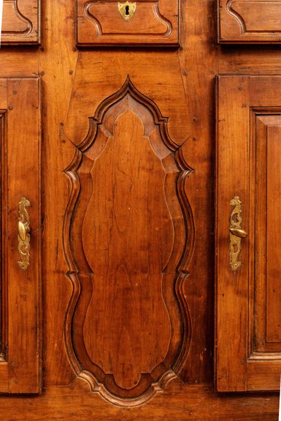 Natural wood sideboard with molded and carved...