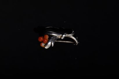 Small silver plated pin brooch featuring...