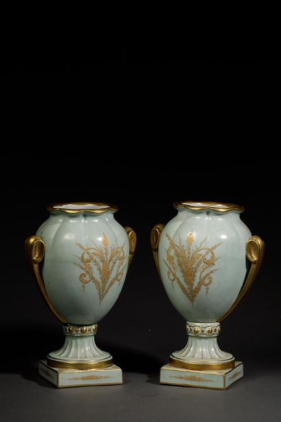 Pair of polychrome glazed porcelain vases...