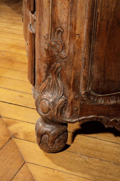 A tomb-shaped chest of drawers made of natural,...