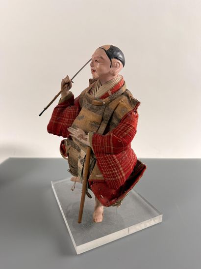 JAPAN
Boiled-paper doll with silk clothing...