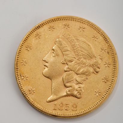 Une pièce de 20 dollars or datée de 1858...