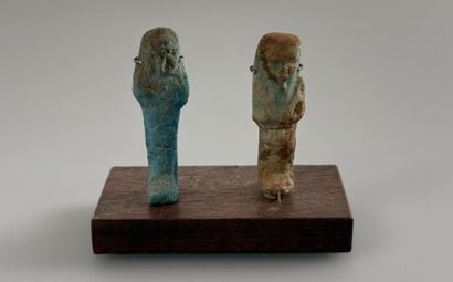 Two uninscribed ushabti figures depicting...