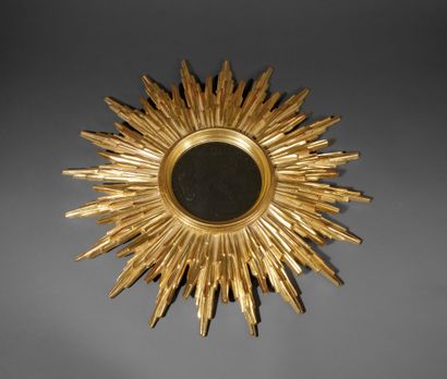 Radiating wooden mirror in the Louis XIV...