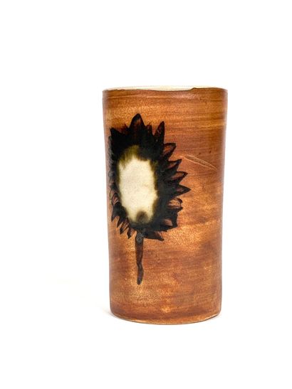 Small, cylindrical vase made of chocolate-brown...