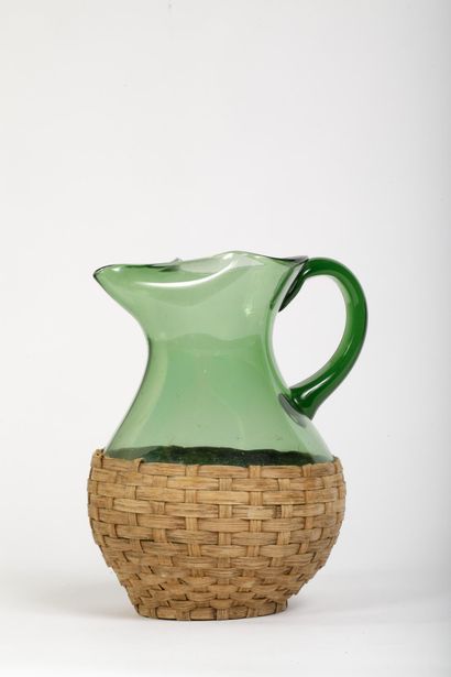 Green glass pitcher, tinted throughout, enclosed...