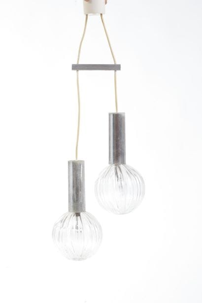 A pair of double-cascade pendant lights made...