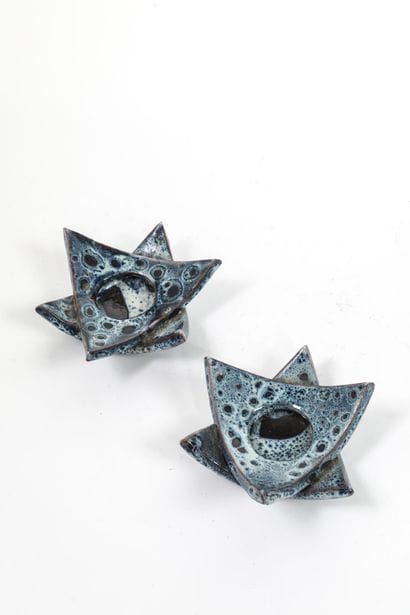 Pair of glazed ceramic candleholders in shades...