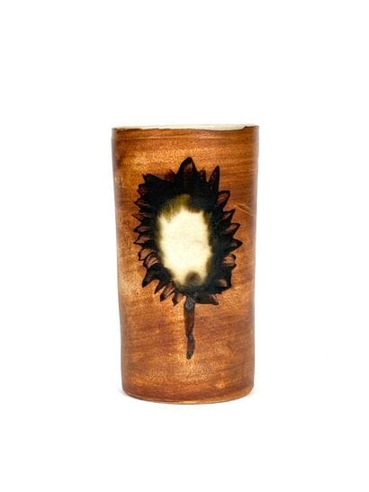 Small, cylindrical vase made of chocolate-brown...