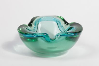Free-form molded glass ashtray in shades...