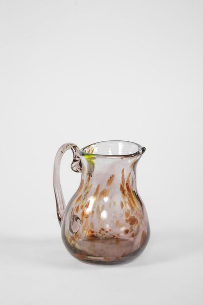 Small multicolored speckled blown glass pitcher...