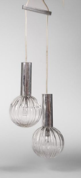 A pair of chrome-colored plastic cascade...